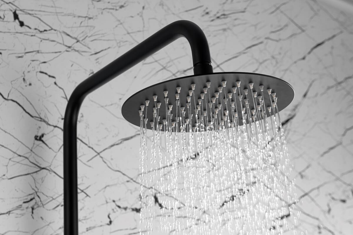 altura grifo plato ducha